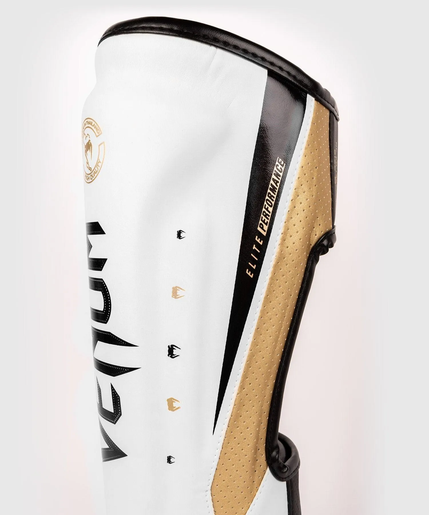 Espinilleras Venum Elite Evo - Blanco/Dorado